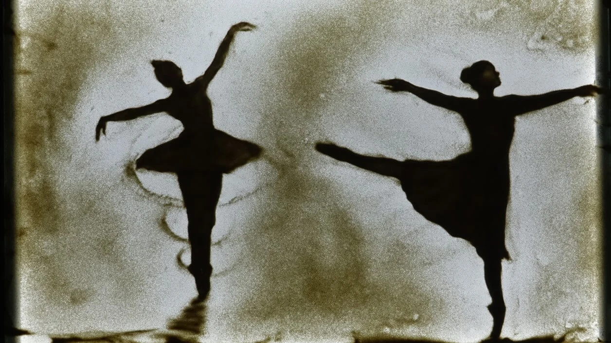 Sand silhouettes of dancers
