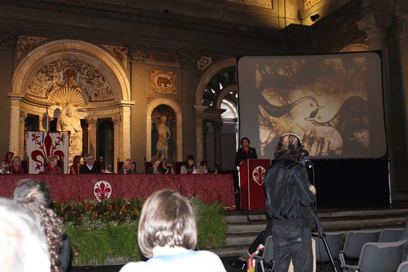 Sand art event in an ornate venue